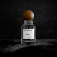 Black perfume bottle, sophisticated black fragrance
