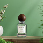 Green perfume bottle, fresh green fragrance